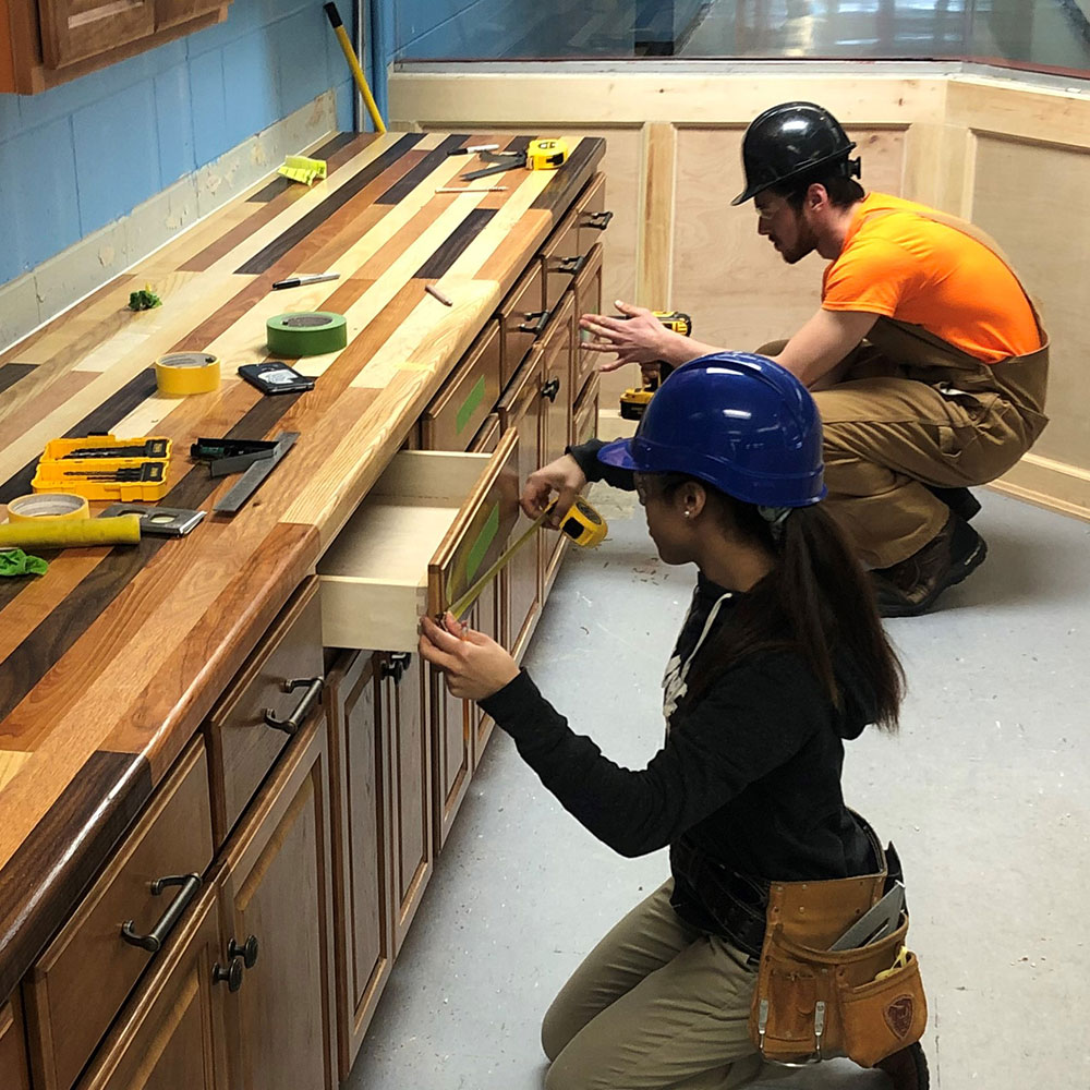 UBC Job Corps students cabinet installation