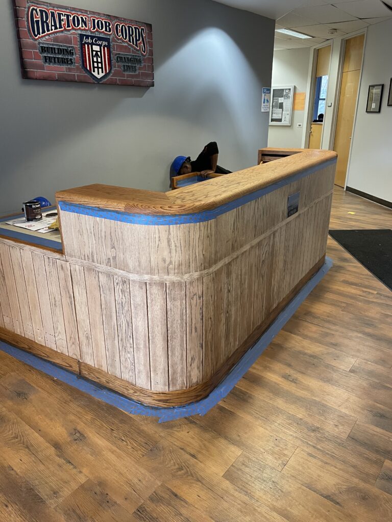 Grafton students complete front entry desk project.